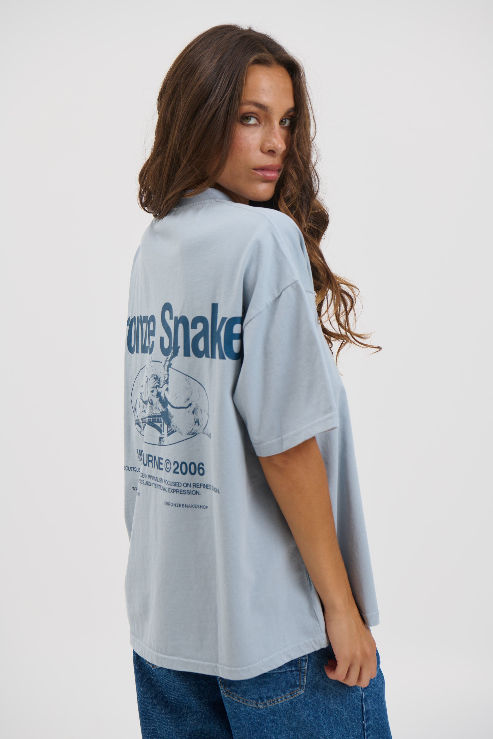 Unisex Bronze Snake Melb Tee Baby Blue