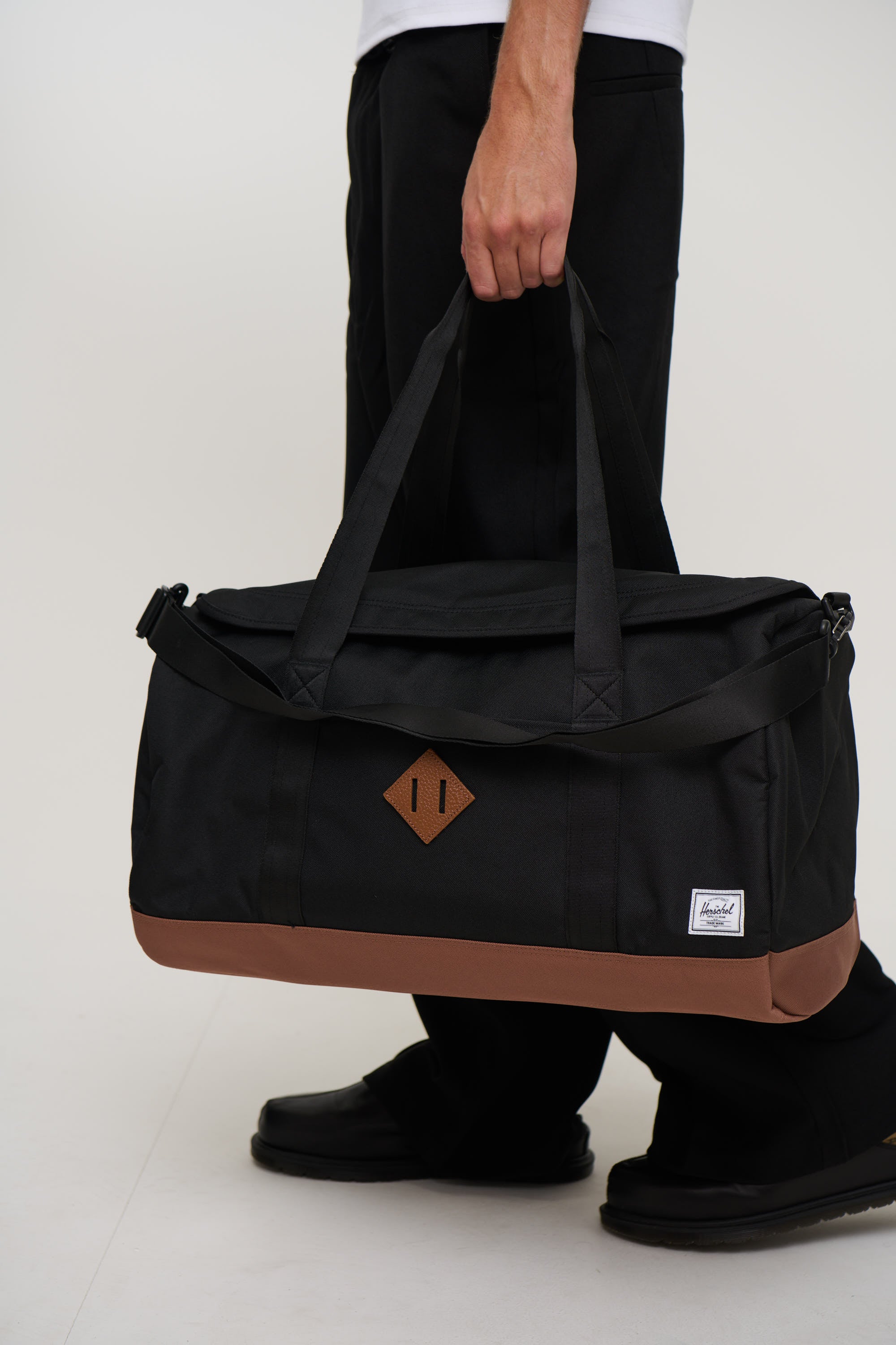 Herschel Novel Duffle Black/Saddle Brown