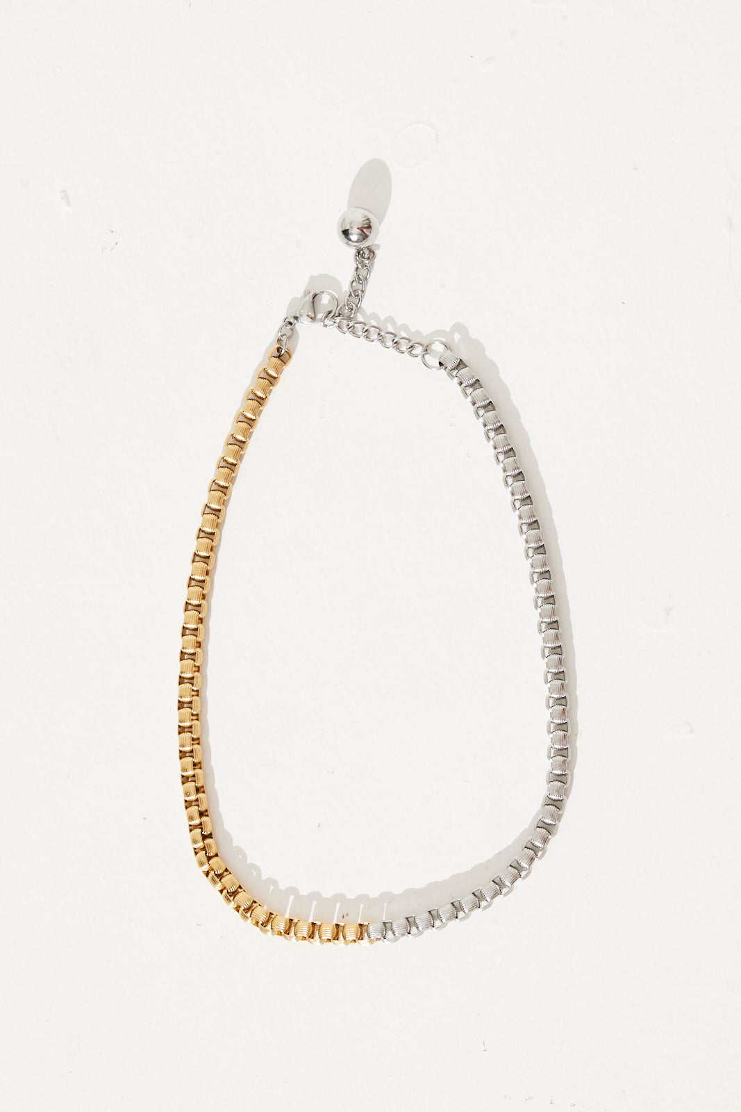 Half silver half on sale gold chain