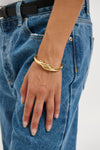 Interlock Twist Bangle Gold