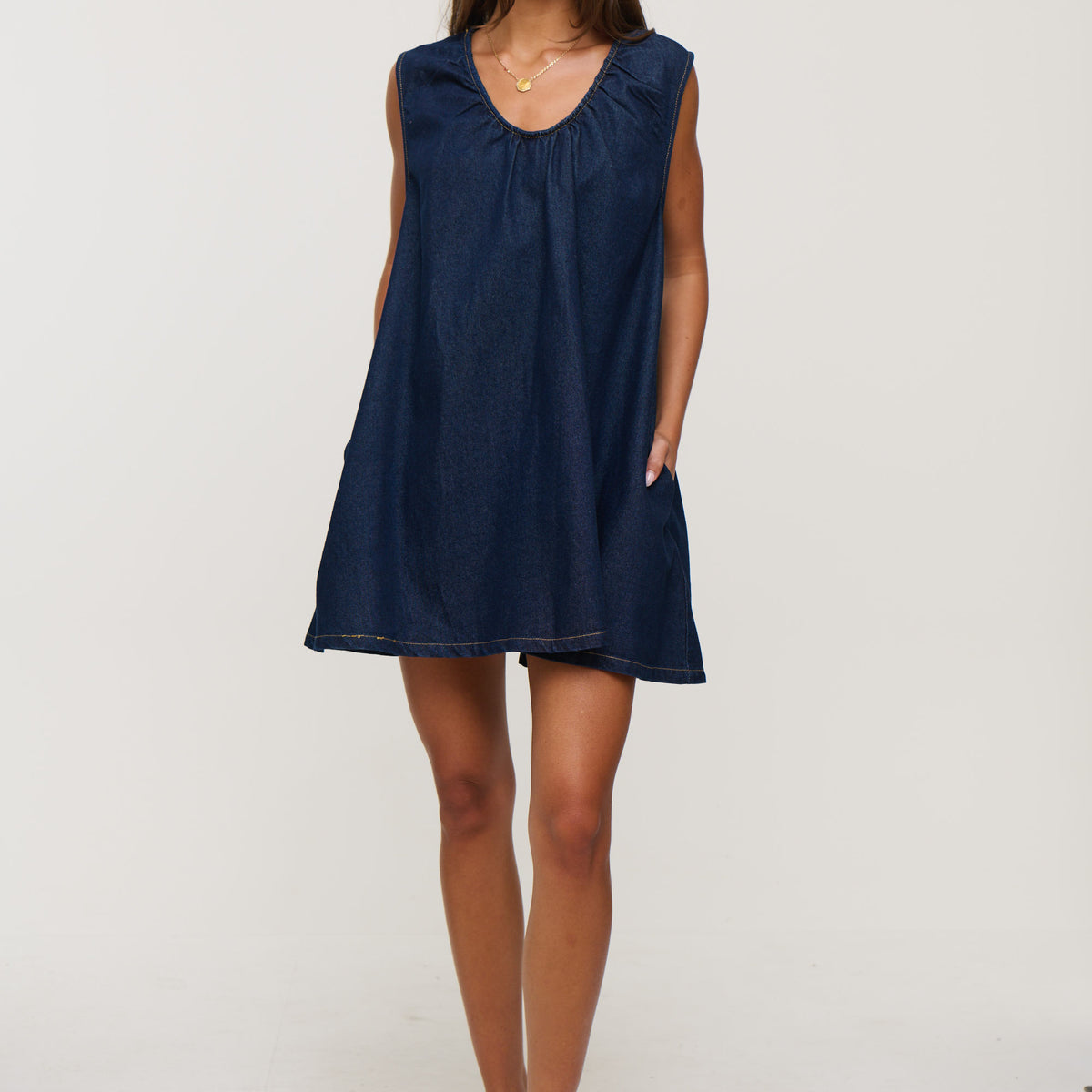 bronze snake denim dress sitting pretty. The Kaneisha Denim Dress. As seen on @delanidavid  www.bronzesnake.com
